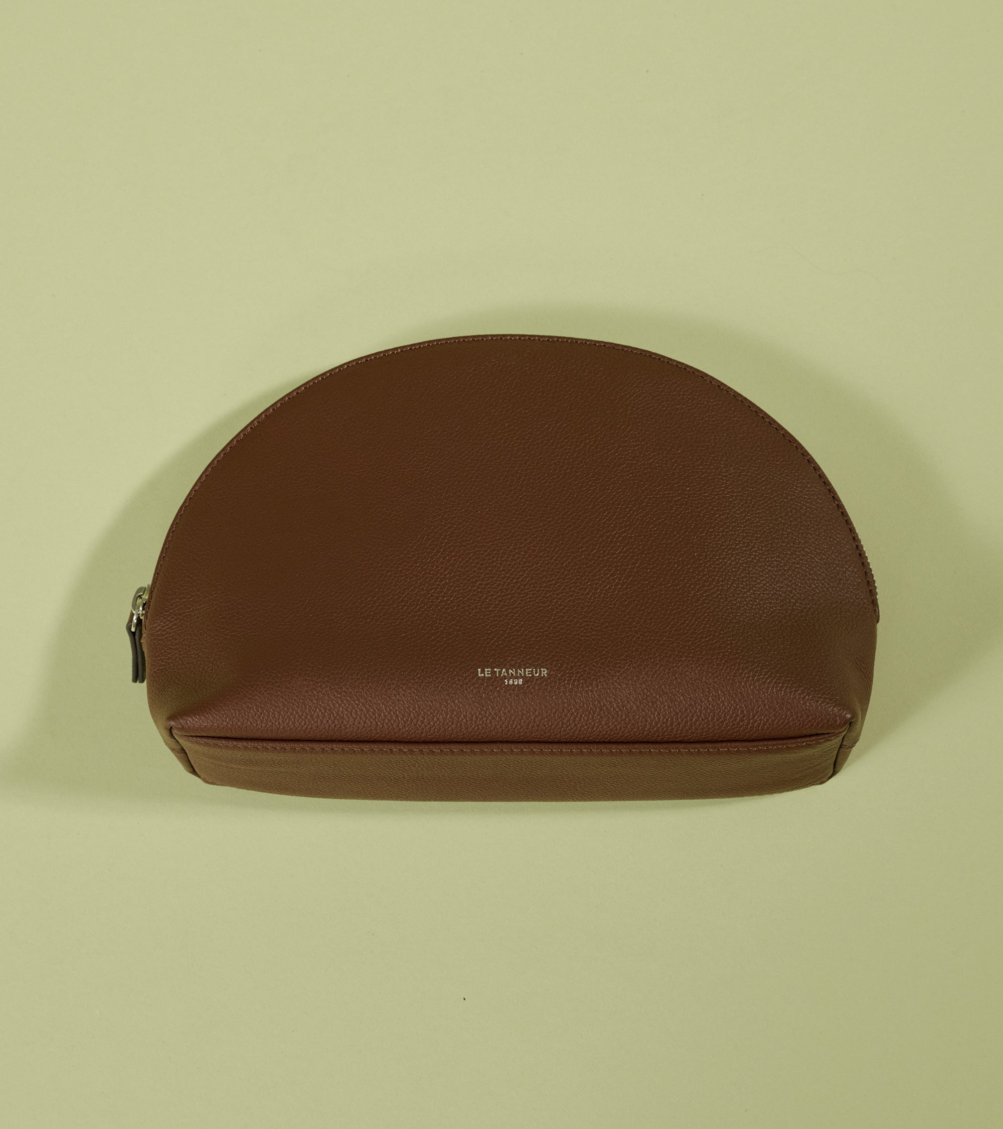 Trousse de toilette demi-lune en cuir grainé